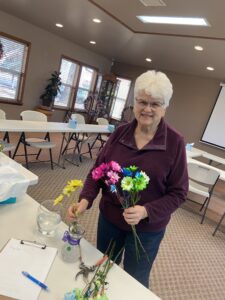 Diane making flower arrangements